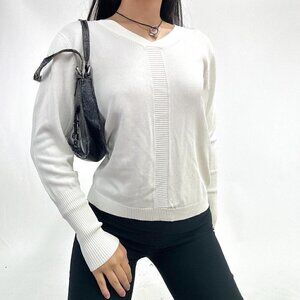 White ribbed long sleeve knit top